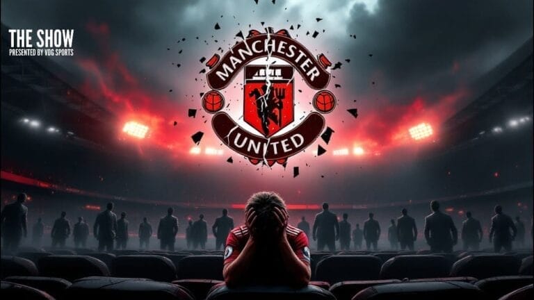 A person sits with their head in hands in a stadium, facing the Manchester United logo, perhaps pondering the decisions made during Ed Woodward's tenure.