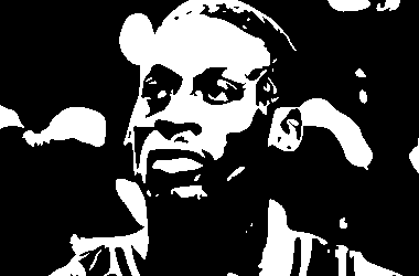 Silhouette-style image of a person wearing a sleeveless top, depicted in dark green tones against a black background. The serious expression reflects the impact of 90s basketball, with emphasis on the focused facial features and sturdy shoulders reminiscent of NBA legends.